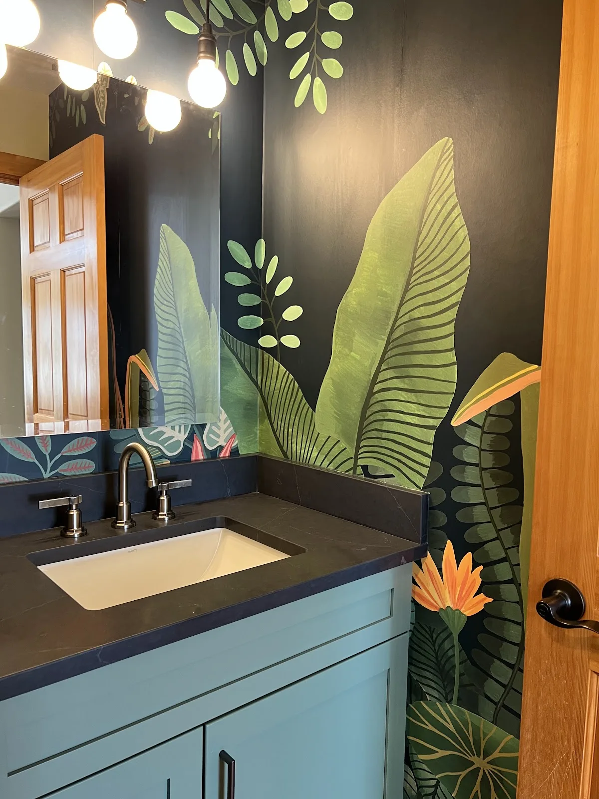 Bathroom with tiled shower, tub surround and a decorative tile niche in Bellingham, WA — Living By Design (2)