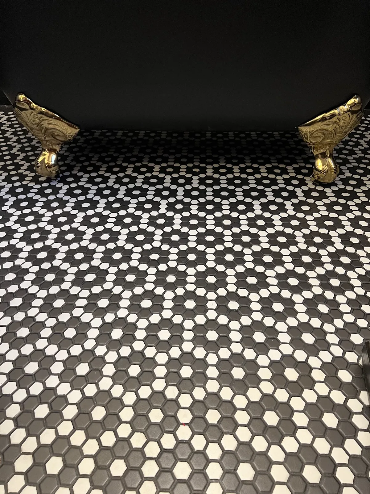 Bellingham church rectory bath with black walls, clawfoot tub and black-and-white mosaic tile floor in Bellingham, WA — Living By Design (5)