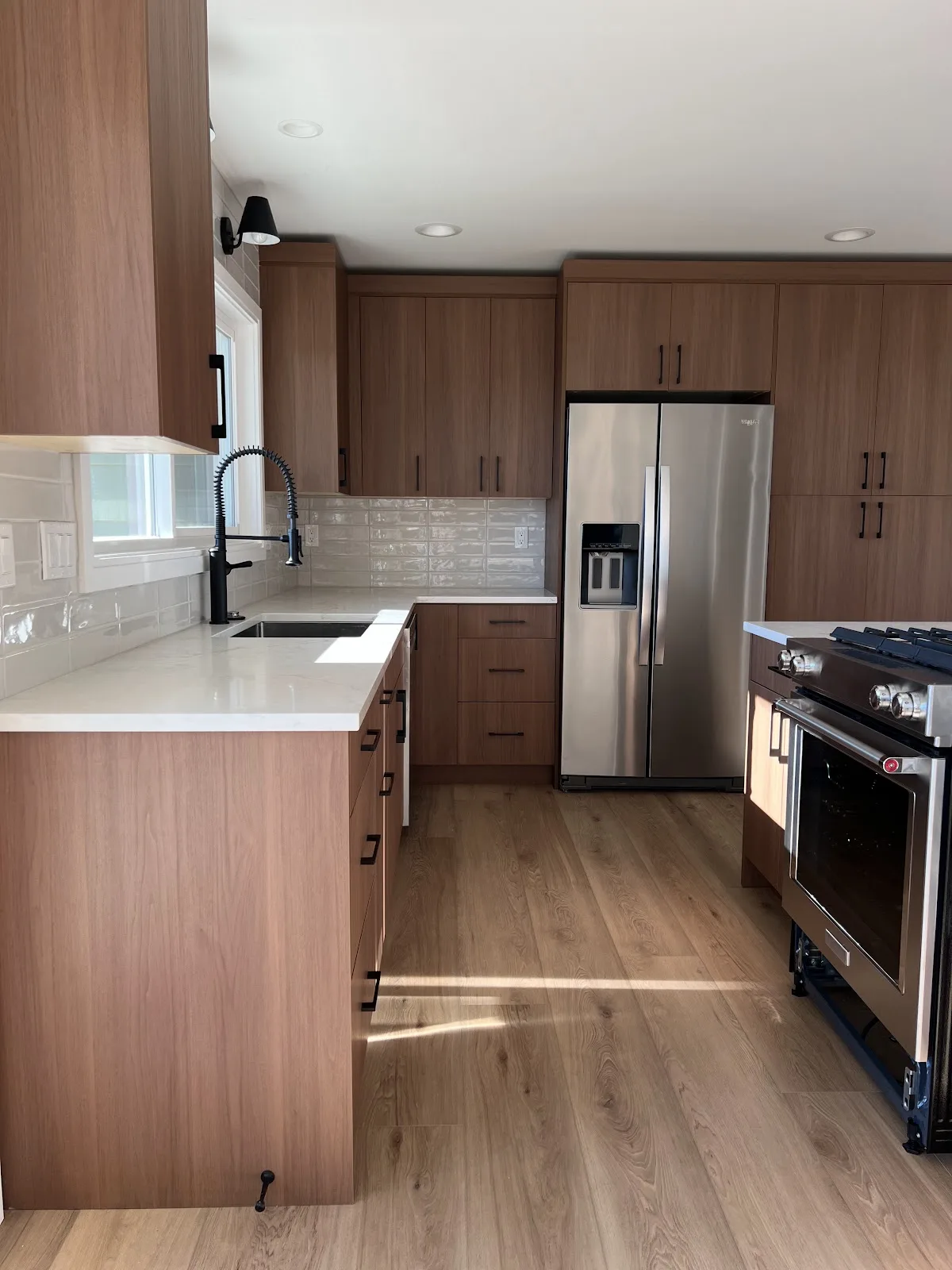 Bellingham rental kitchen, bath and laundry refresh with wood cabinetry and quartz counters in Bellingham, WA — Living By Design (4)