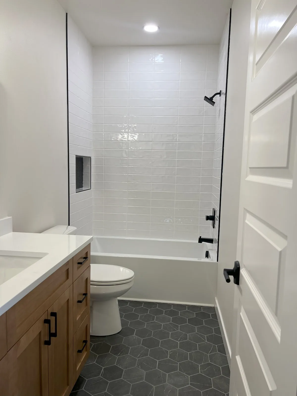 Everson new-build kitchen with navy island and quartz countertops in Everson, WA — Living By Design (3)