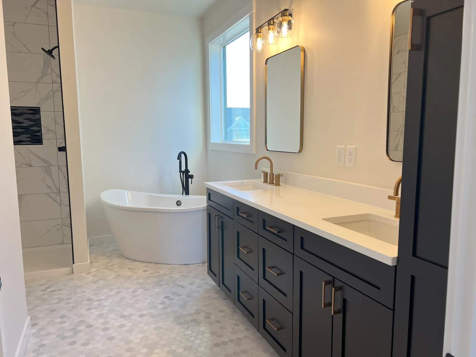 Everson new-build kitchen with navy island and quartz countertops in Everson, WA — Living By Design (5)
