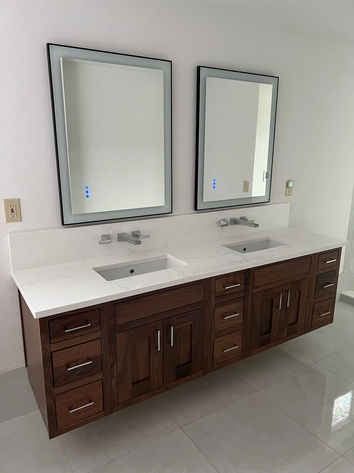 Ferndale bathroom with dark wood double vanity, quartz tops and freestanding slipper tub in Ferndale, WA — Living By Design (2)