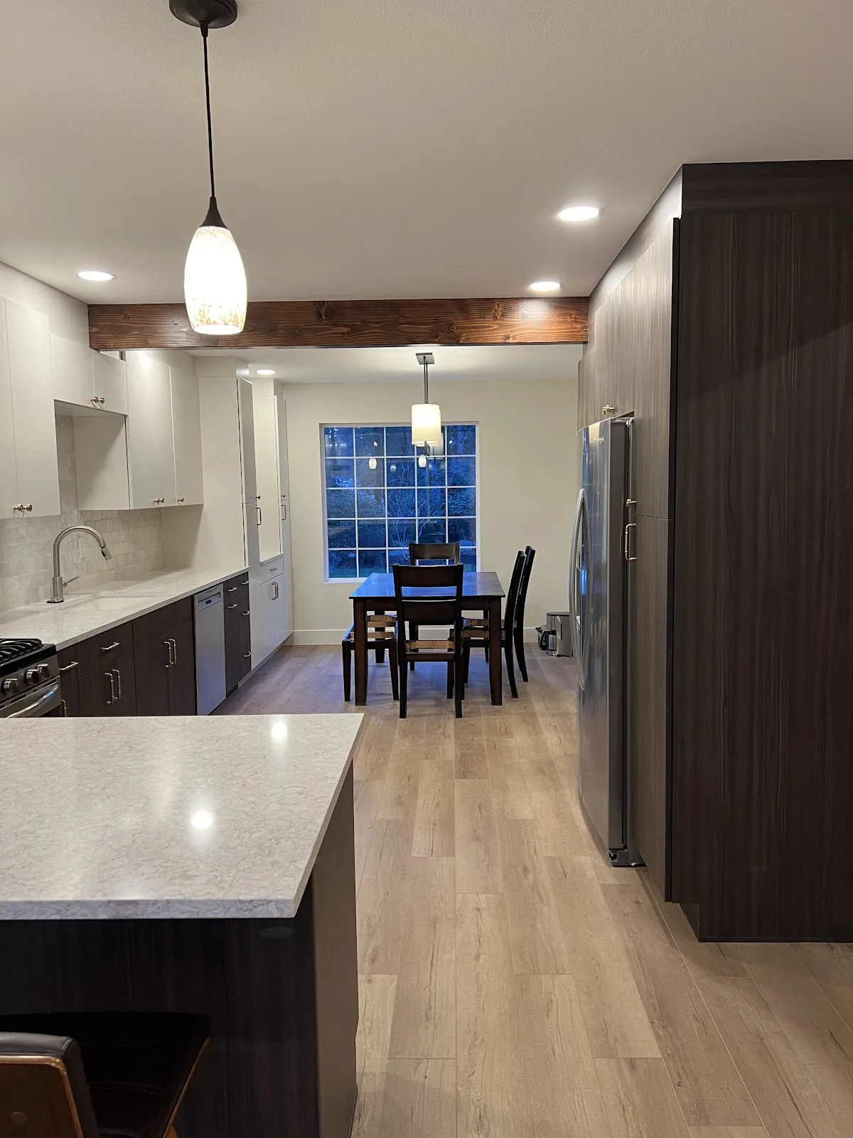 Ferndale kitchen with two-tone cabinetry, quartz counters and tile backsplash in Ferndale, WA — Living By Design (2)
