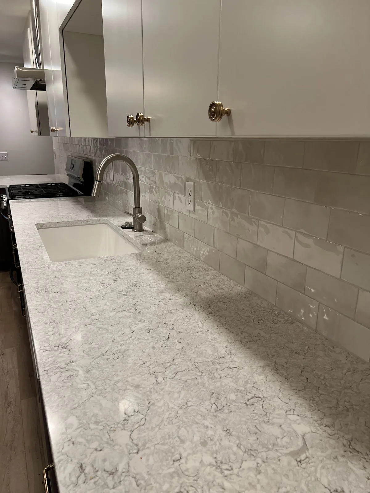 Ferndale kitchen with two-tone cabinetry, quartz counters and tile backsplash in Ferndale, WA — Living By Design (5)