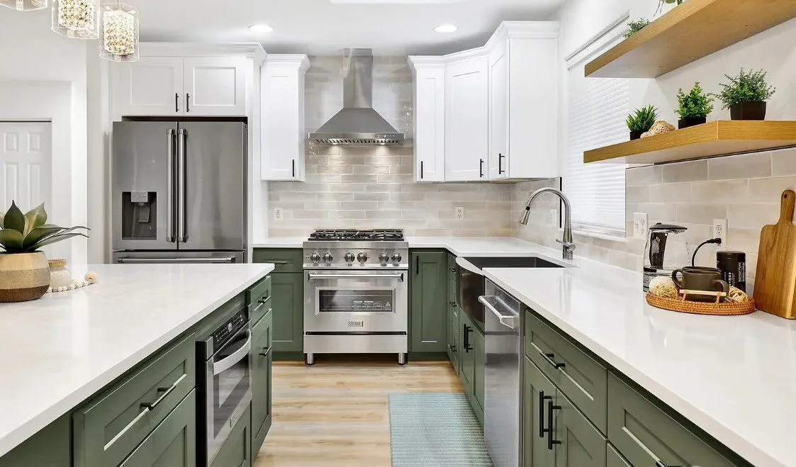 Sudden Valley kitchen with sage-green cabinetry and quartz island in Bellingham, WA — Living By Design (2)